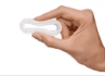 Hand holding a flexible estradiol vaginal ring